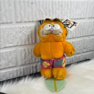 Vintage Wave Rider Garfield Orange Plush Toy with Floral Shorts
